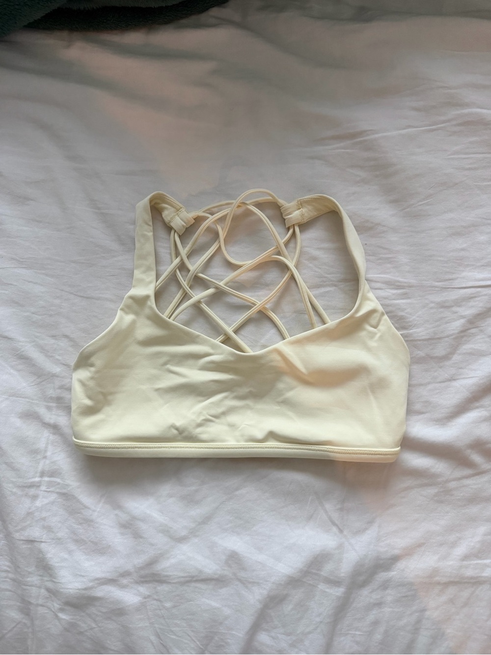 Light yellow Lululemon sports bra